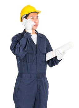 Worker holding blueprint and used smartphone photo