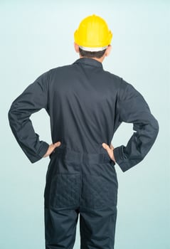 Man in coveralls helmet hardhat photo