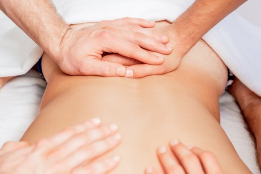 Young man receiving back massage. photo