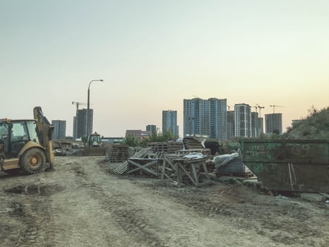 construction landscape. place of construction of new residential buildings. quarter for people's lives. construction equipment and materials on site photo
