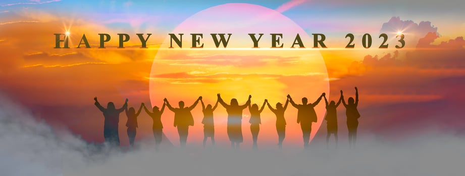 Happy new year 2023, Keep fighting together, Silhouette of 2023 letters on the mountain with business people raised arms in teamwork concept at sunrise. photo