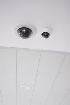 CCTV security camera operating outdoor photo