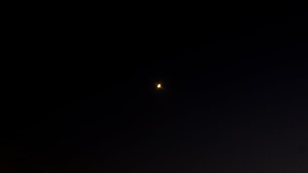 half moon in the dark sky photo