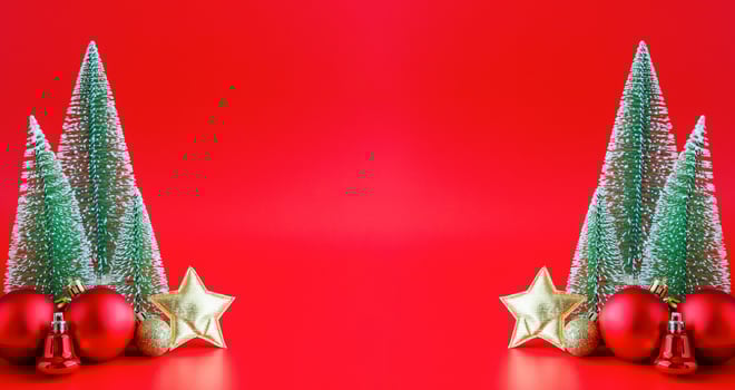 Christmas tree and baubles on red background new year  holiday celebration concept photo