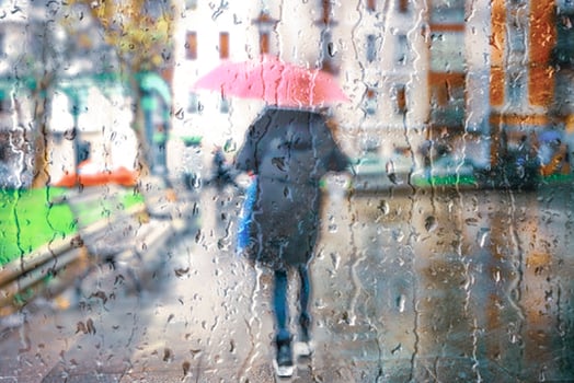 people with an umbrella in rainy days in Bilbao city, basque country, spain photo