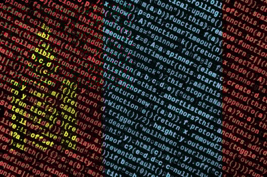 Mongolia flag is depicted on the screen with the program code. The concept of modern technology and site development photo