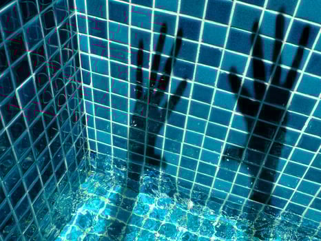 Hand shadows on the pool mosaics photo