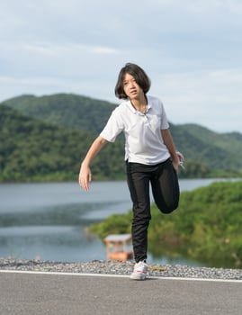 Woman short hair doing exercising outdoor photo