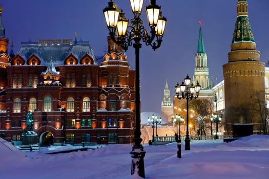 Kremlin towers in winter snowing evening, Moscow photo