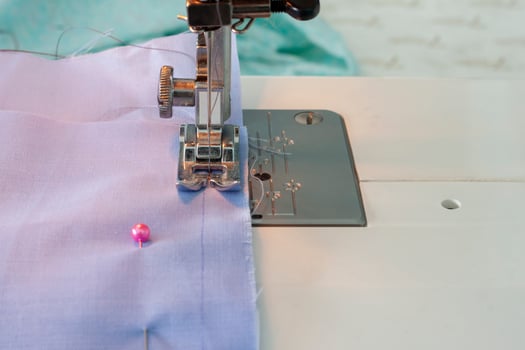 Sewing machine is a technology that helps sewing faster and easier. photo