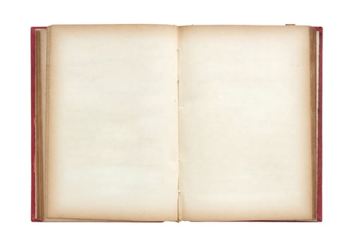Old book open isolated on white background with clipping path photo