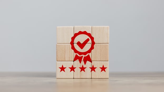 certification and quality concept cube wood aligned icon showing quality assurance certificate  organization must have a certificate  confidence in good service. create satisfaction for customers photo