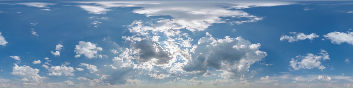 blue sky with beautiful clouds as seamless hdri 360 panorama view with zenith for use in 3d graphics or game development as sky dome or edit drone shot photo