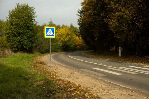 Turning road. Pedestrian crossing across street. Track details. photo