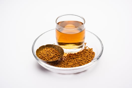 Fenugreek Seeds or Methi Dana drink by soaking it in water overnight. Indian Health tonic photo