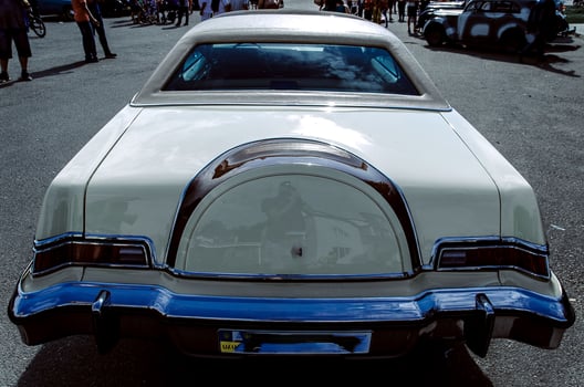 Color detail on the headlight of a vintage car photo