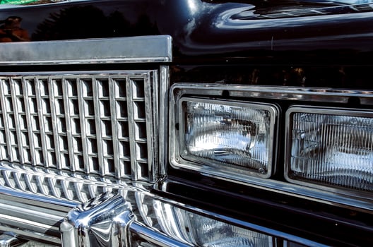Color detail on the headlight of a vintage car photo
