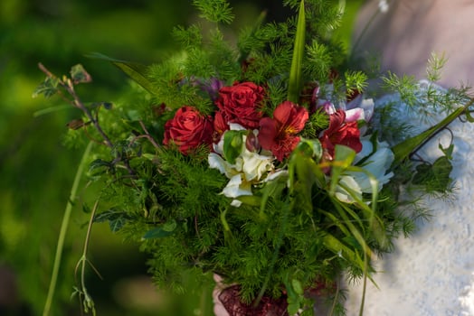 The bride holds a wedding bouquet in her hands, wedding day flowers. photo