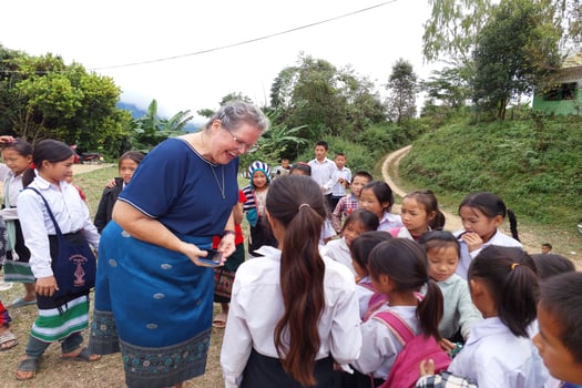 25 october 2022, Samneua district, Houaphanh province, Laos. The teacher conducts a lesson with children outside. Happy children back to school again. photo