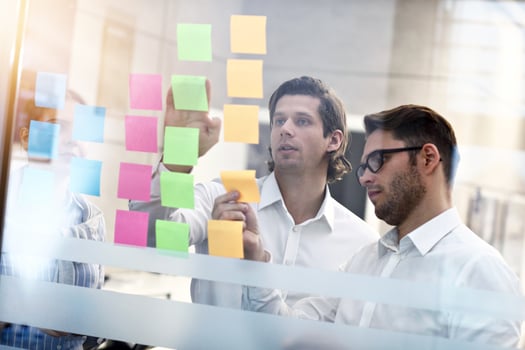 Group of business people brainstorming their ideas photo
