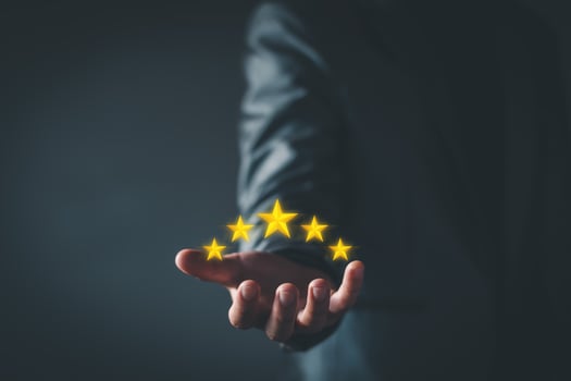 Quality Assurance Concept. Business people show high quality assurance mark, good service, premium, five stars, premium service assurance, excellence service, high quality, business excellence. photo