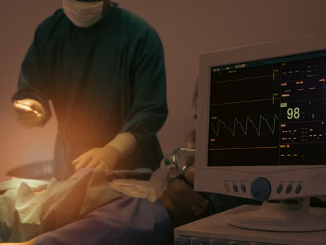 Patient electrocardiogram monitoring in hospital surgical operating room photo