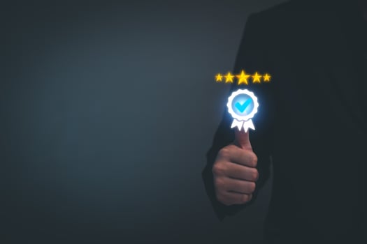 Quality Assurance Concept. Business people show high quality assurance mark, good service, premium, five stars, premium service assurance, excellence service, high quality, business excellence. photo