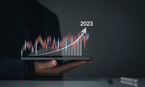 Digital marketing 2023 goals. Businessman analyzing internet marketing online, 2023 business planning, business skyrocket, online stock market analysis, stock chart upward trend, digital stock trading photo