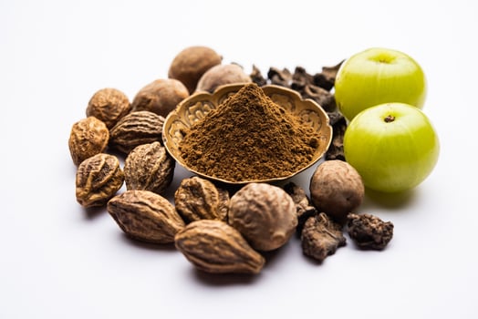 Ayurvedic Triphala churan or trifala powder is an ancient medicine for bowel movement, indigestion photo