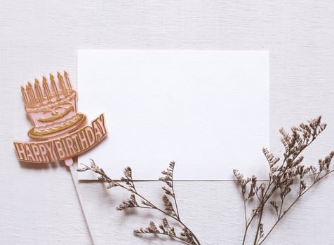 Happy birthday tag and blank postcard with flower photo