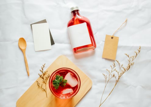 Cold brew tea branding mockup set with glass of iced tea and tag card photo