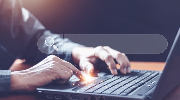 Data Search Technology Search Engine Optimization. man's hands are using a computer notebook to Searching for information. Using Search Console with your website. photo