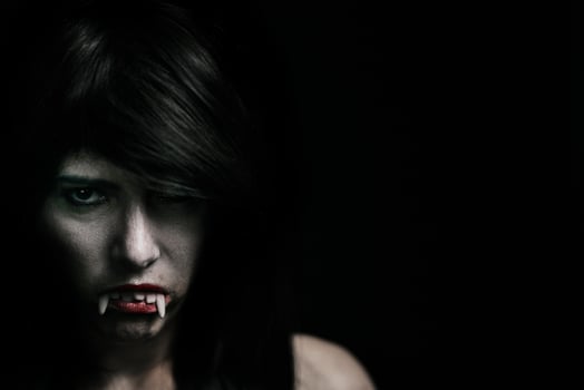 Halloween Vampire Beautiful Woman over black photo