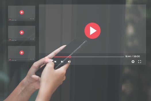 Concept of streaming online. Men's hands showing streaming screen. To represent the use of the Internet online photo