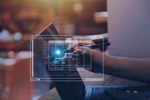 Analyst working with computer in Business Analytics and Data Management System to make report with KPI and metrics connected to database. Corporate strategy for finance, operations, sales, marketing photo