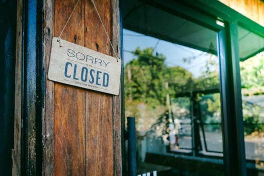 Close label in front of coffee shop photo