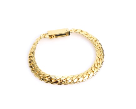 Gold jewelry chain necklace isolated on white photo