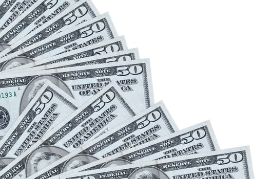 50 US dollars bills lies isolated on white background with copy space stacked in fan close up photo