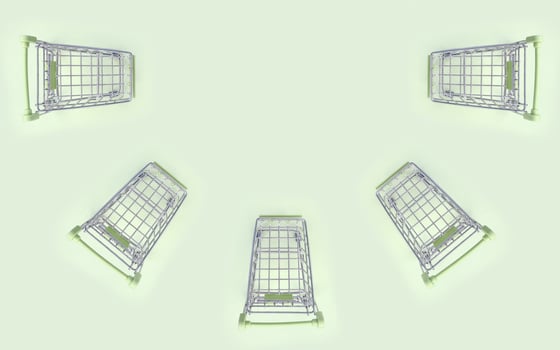 Pattern of many small shopping carts on a lime background photo