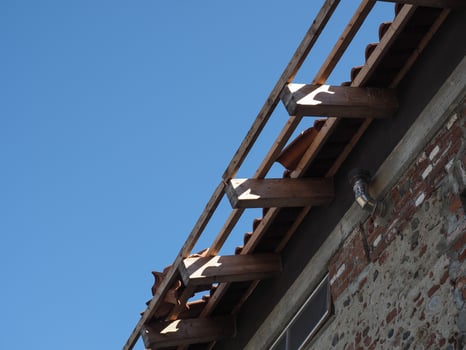 roof damaged by gales during storm photo