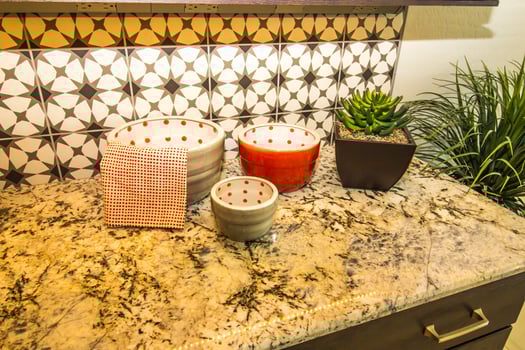 Decorator Bowls And Plants On Granite Kitchen Counter photo