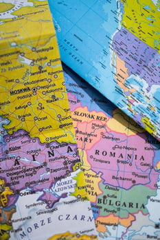 pile of maps of europe and usa, closeup photo