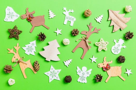Christmas green background with holiday toys and decorations. Happy New Year concept photo