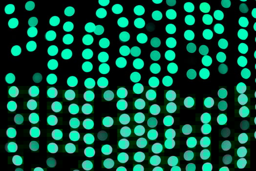 Unfocused abstract colourful bokeh black background. defocused and blurred many round blue light photo