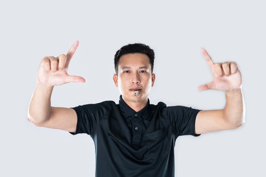 Football referee showing VAR symbol. photo