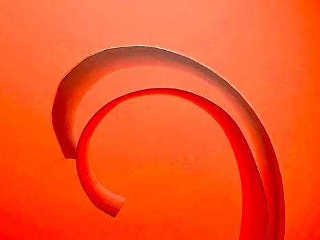 vibrant colourful red paper spiral ribbon high quality image or photograph photo