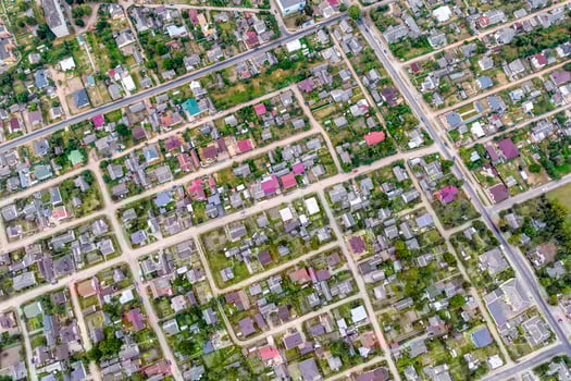 panoramic aerial view of private development with country houses or village photo