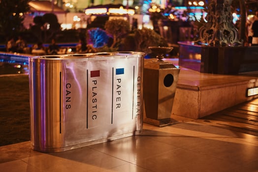 Containers for separate waste collection in the night city street photo