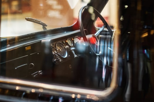 Close up headlight of a black vintage car photo