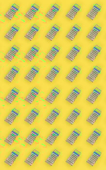 Small stainless steel graters lies on a pastel colored paper. Kitchen accessories. Tools for cooking. Flat lay top view photo